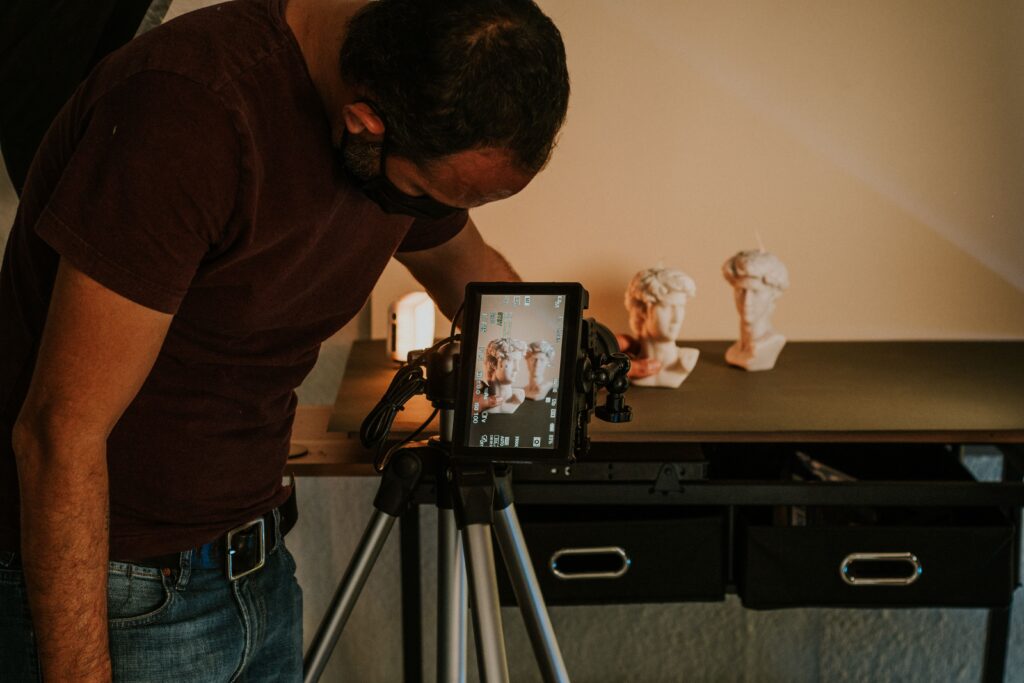 Content creator setting up a camera for social media content production