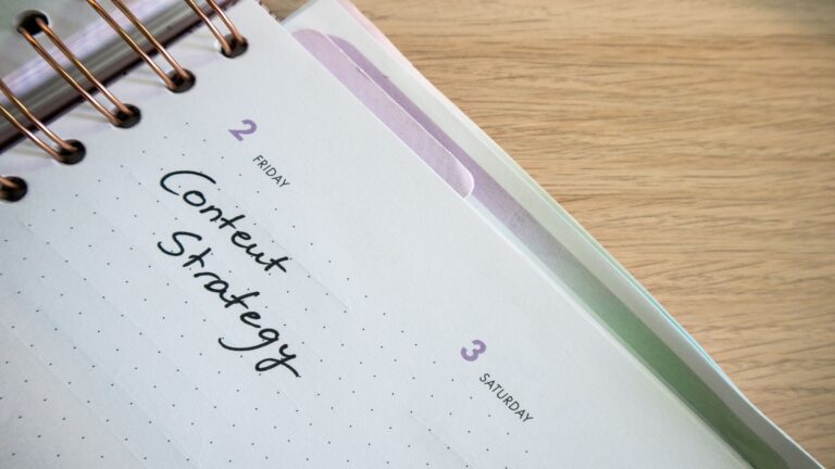 Content strategy planner notebook on a wooden desk